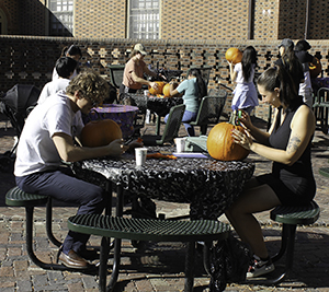 The annual pumpkin carve for the international community, including children and Global Friends, is one of the most popular events. (Photo by Kate Hoving)
