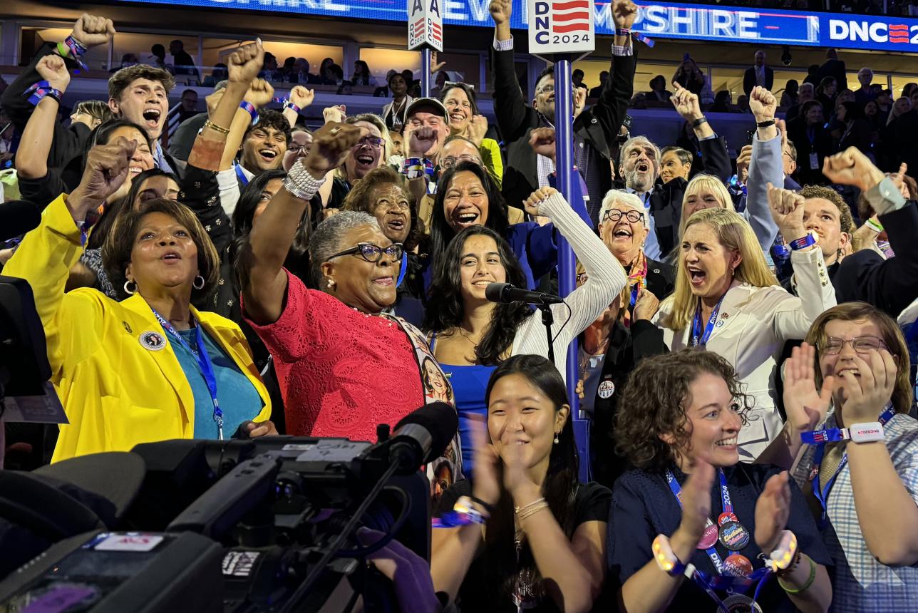 1693 Scholar Aliyana Koch-Manzur '28 (center, at microphone) was one of the youngest delegates to this year's Democratic National Convention in Chicago, Aug. 19-22. (Courtesy photo)