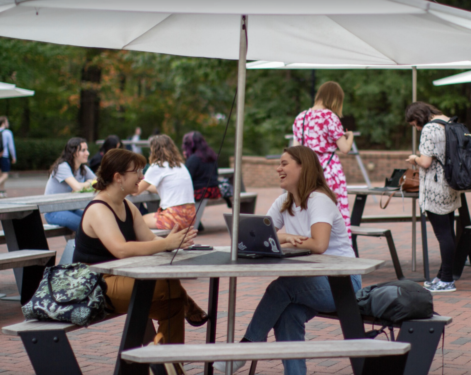 Emma Henry '25 (left) interviews Isabel Pereira-Lopez ’24 (right) for a story about research into witchcraft. (Photo by Tess Willett)