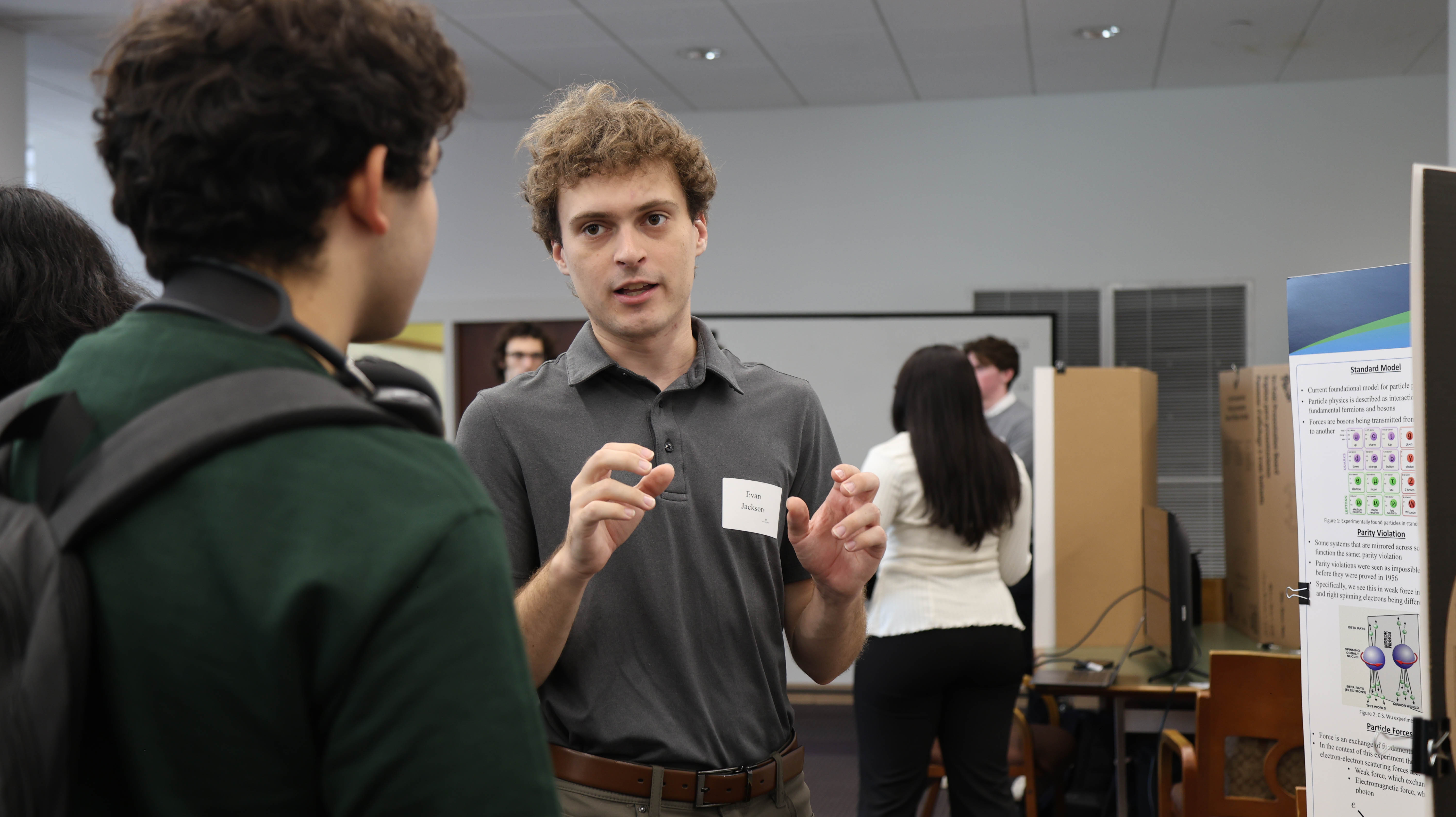 Physics major Evan Jackson '25 presented his honors thesis research at the Charles Center's annual Fall Undergraduate Research Symposium held last month in Swem Library. (Photo by Tess Willett)