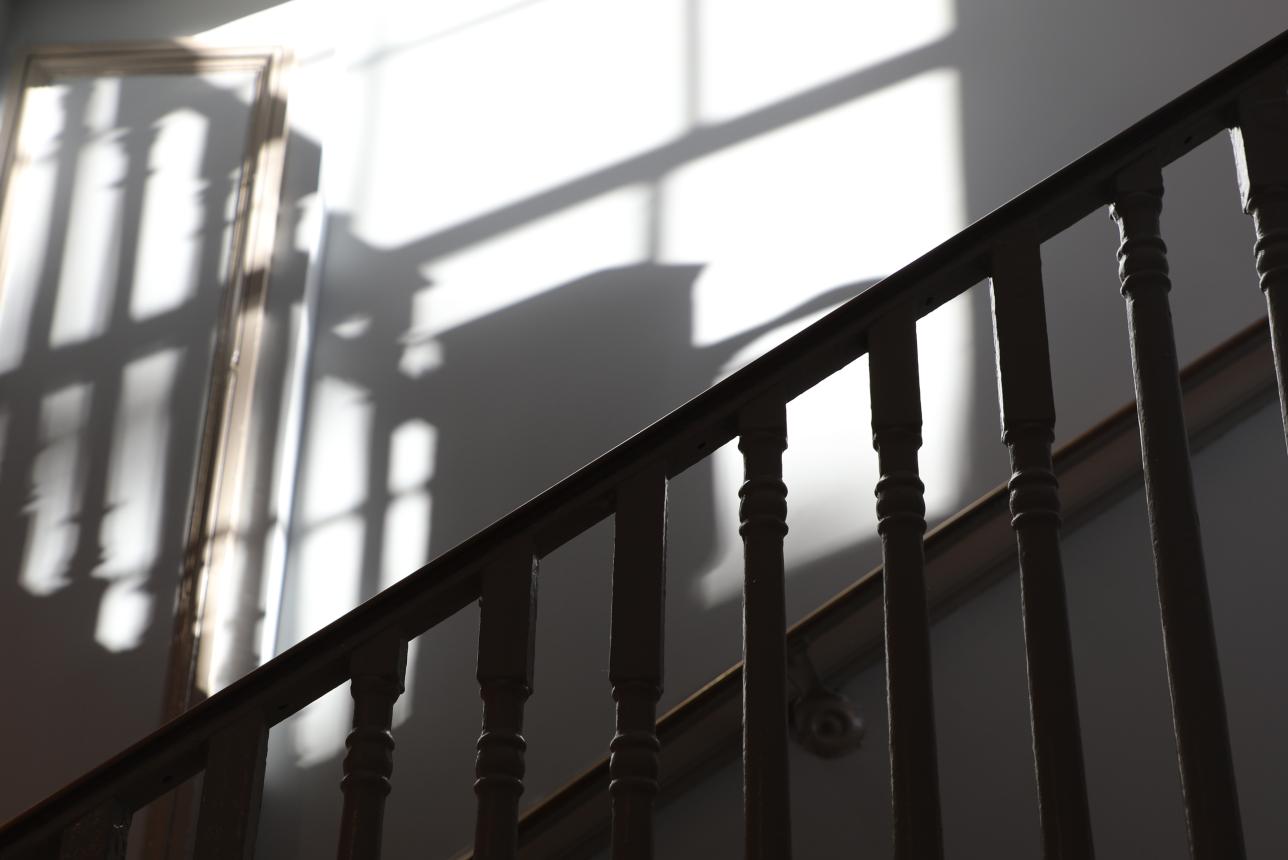 Preserved architectural details, including much of the original interior woodwork, highlight the historic nature of newly renovated Monroe Hall. (Photo by Ted Maris-Wolf)