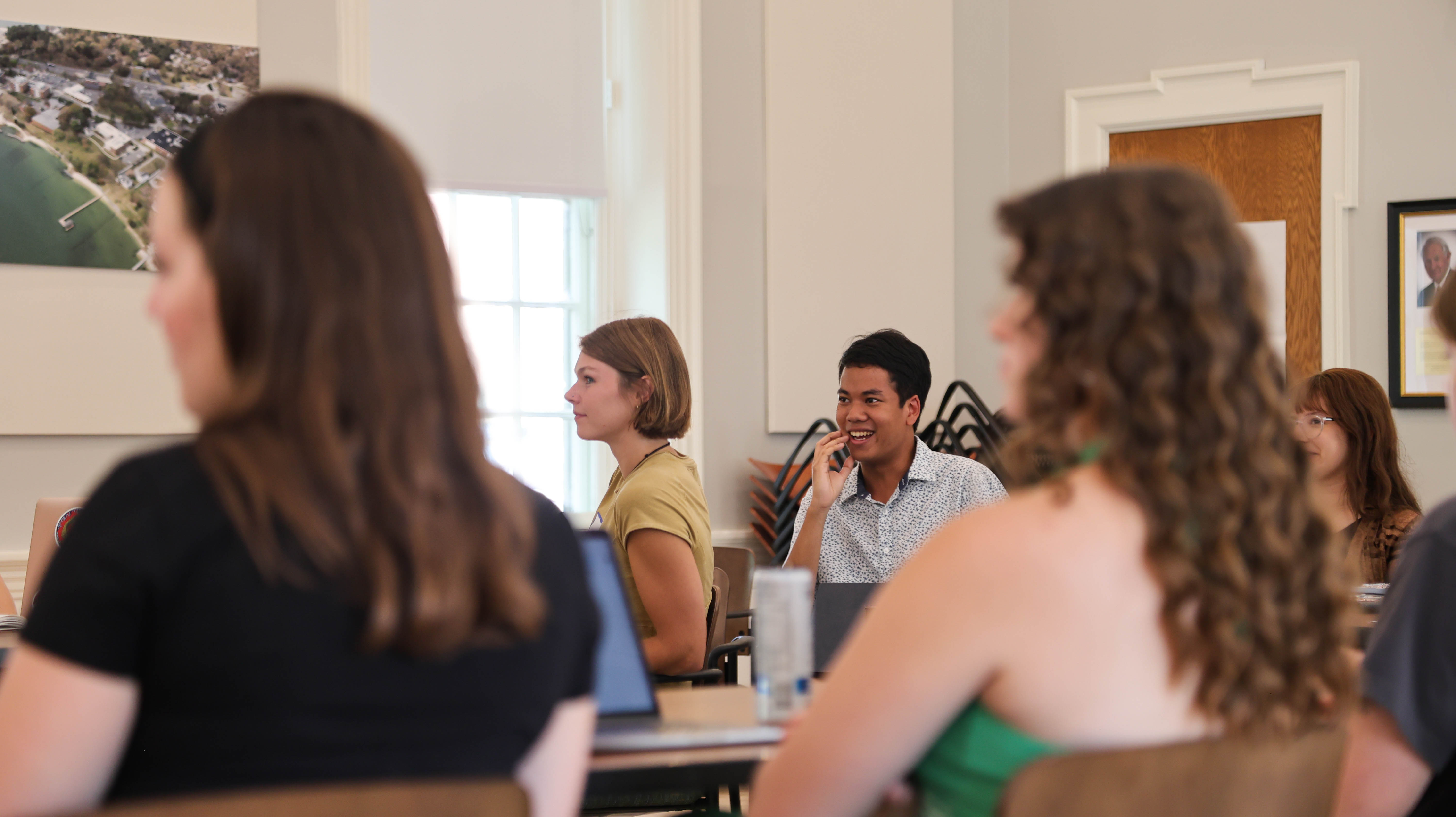 Government major Peerawut Ruangsawasdi ’26 (center) said, "There is a real demand for journalism at William & Mary, and I’m glad this class is happening to help engage interested students." (Photo by Tess Willett) 