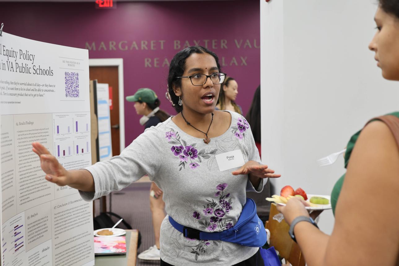 Pooja Muthuraj '25, a business analytics and public policy double-major, discussed her research on menstrual equity policy implementation in Virginia public schools at the Charles Center's Fall Undergraduate Research Symposium Sept. 20 in Swem. (Photo by Tess Willett)