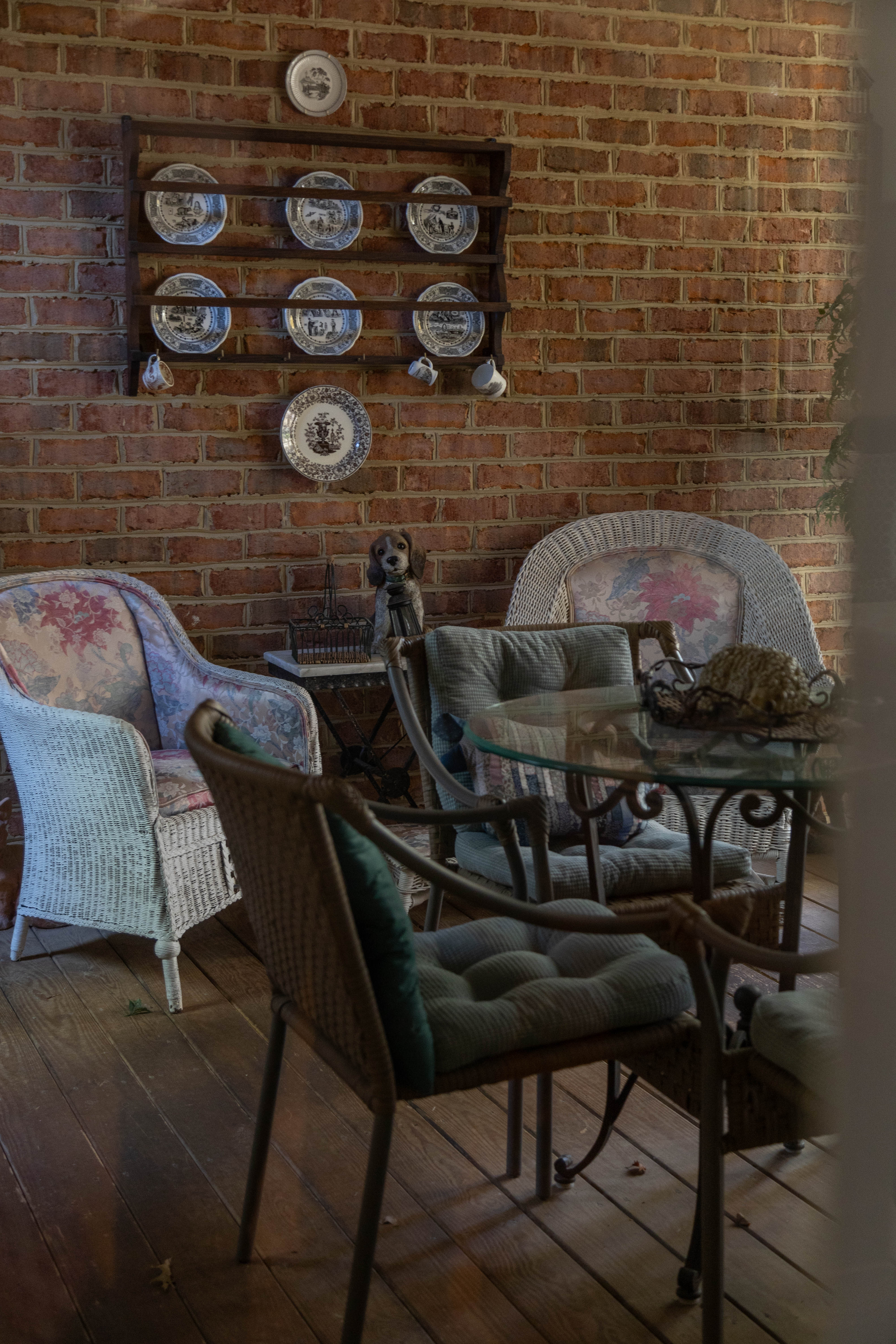 In every room, including the Woody's porch, art and everyday life are interwoven with care, charm, and a dash of humor. (Photo by Tess Willett)