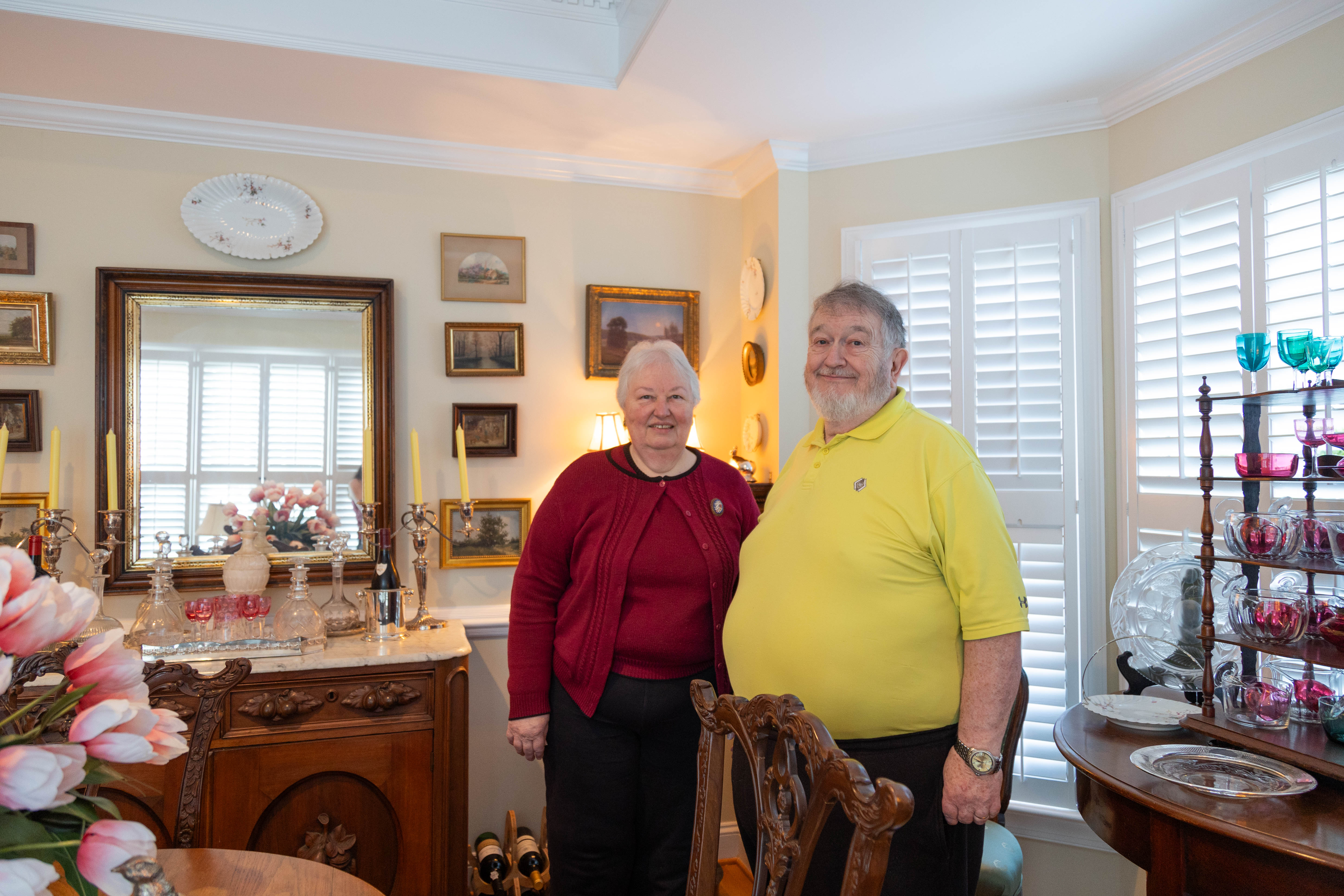 Carol and Robert Woody first met in Williamsburg during her senior year at the university and his first year at William & Mary Law School — in the 10th pew of Bruton Parish Church. (Photo by Tess Willett)