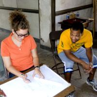 NIAHD Students Drawing a Historic Building 