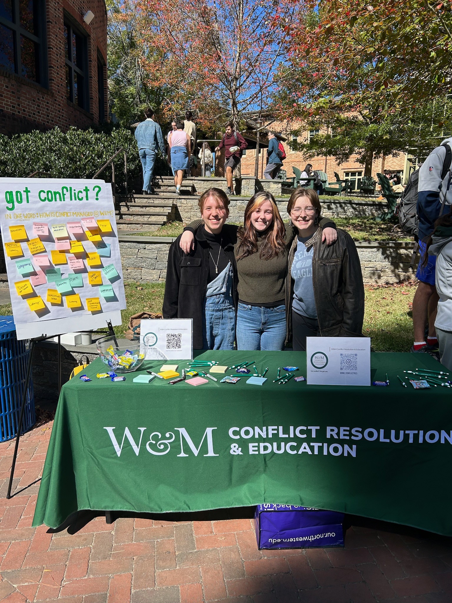 Three students tabling on the Sadler Terrace