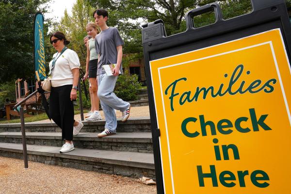 Headquarters & Check-In sign