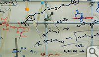 The sash glass of the exhaust hoods in Jonathan Scheerer's chemistry lab 