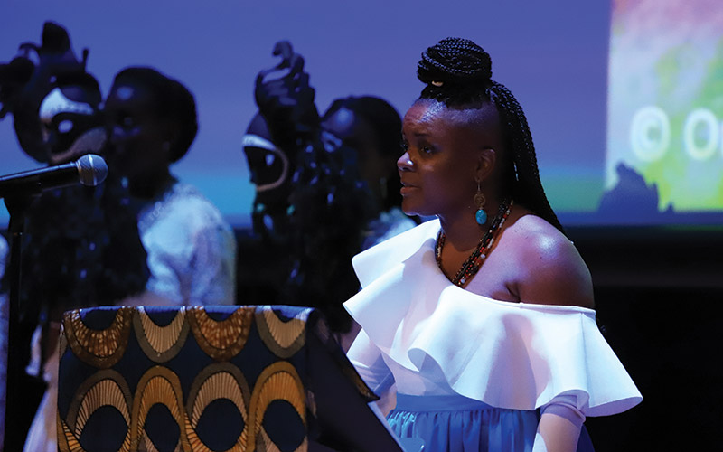 Professor Omiyẹmi Artisia Green, a recipient of the Plumeri Awards for Faculty Excellence, performs on stage